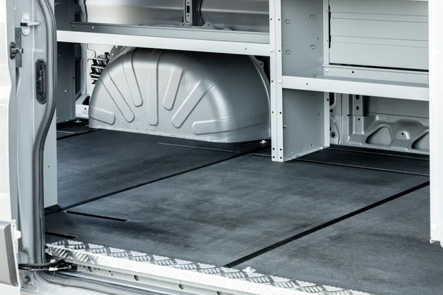 Rigid cargo flooring installed in a work van