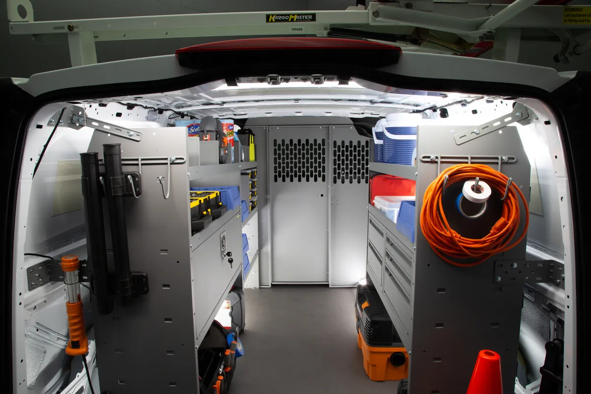 Upfitted vehicle interior with shelving and organization systems