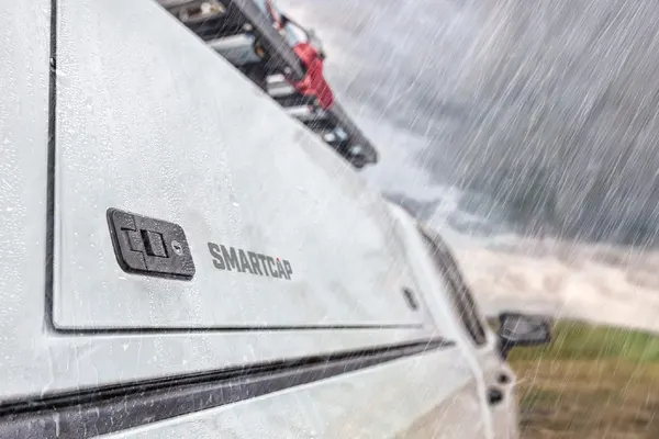 Stainless steel SmartCap side door shedding heavy rain