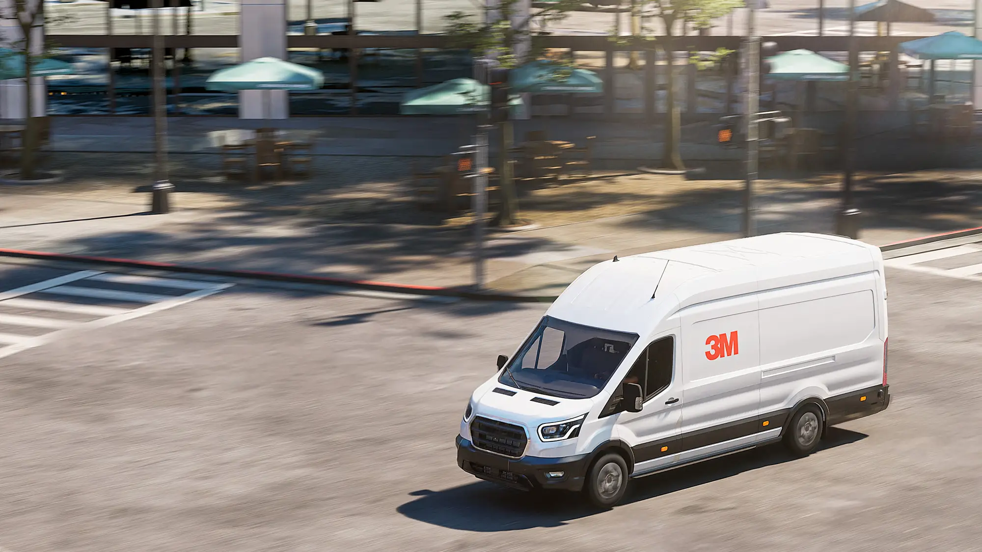 White delivery van driving down a city street