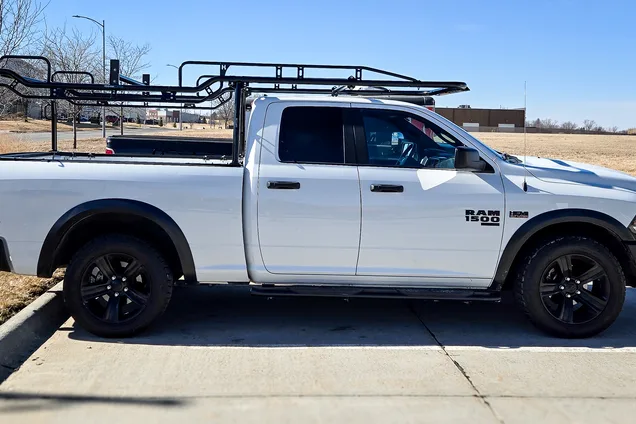 Work pickup fitted with a full-length ladder rack