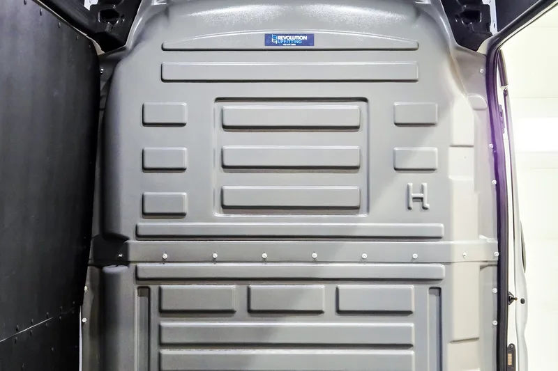 Holman wall liner and bulkhead panel installed in a cargo van
