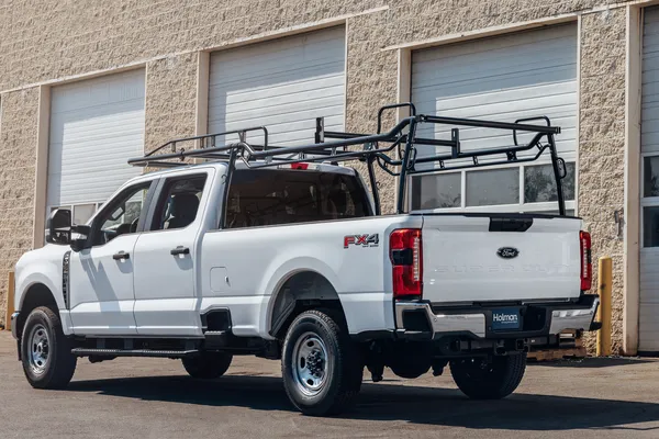 White pickup truck with ladder rack