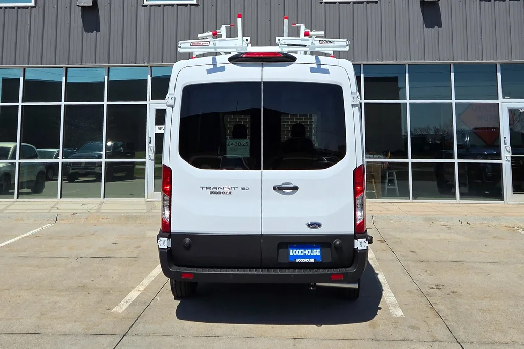 Ford Transit cargo van with a roof-mounted ladder rack